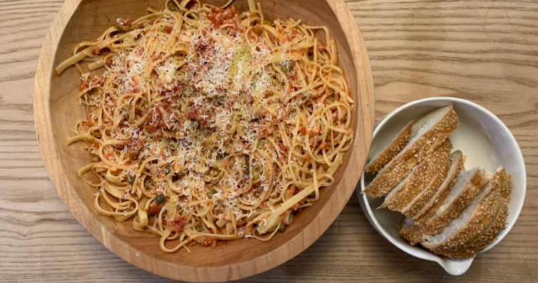 Puttanesca with a side bowl of bread